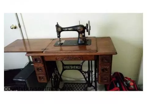 antique Singer sewing machine and cabinet
